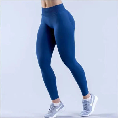 Peach-lift yogabyxor med trippel midjeband – hög midja, skulpterande passform och andningskomfort för gym och vardagsbruk.
