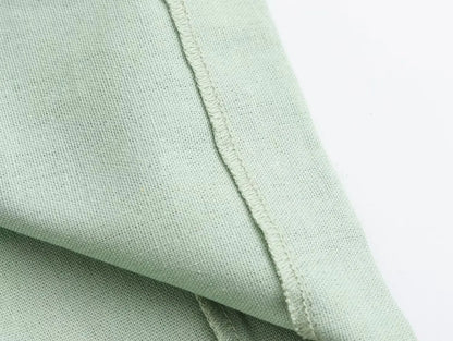 Elegant damekjole med udskæring i taljen – O-hals, ærmeløs, slim fit, splitnederdel