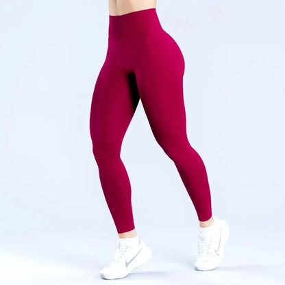 Peach-lift yogabyxor med trippel midjeband – hög midja, skulpterande passform och andningskomfort för gym och vardagsbruk.